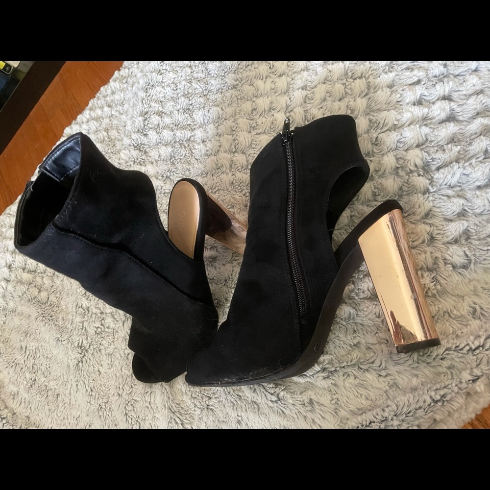 Black booties with rose gold heels